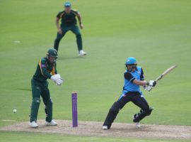 Worcestershire's Daryl Mitchell hits the ball past Nottinghamshire wicketkeeper Tom Moores during Royal London One Day Cup north group match at Trent Bridge, Nottingham.