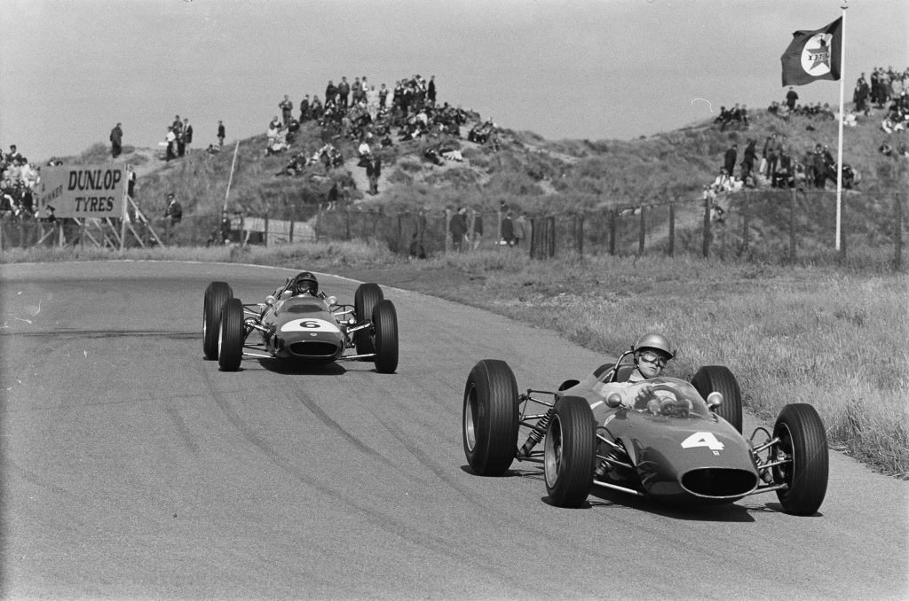 An action shot of two Formula One cars