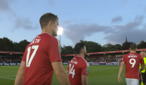 Matt Smith under the lights. Credit: Salford City Youtube screenshot. https://www.youtube.com/watch?v=wVCiTpfnlnk