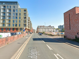 Three men and a woman charged over suspected stabbing on Adelphi Street