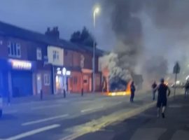 Firefighters rush to the scene as bus bursts into flames in Eccles