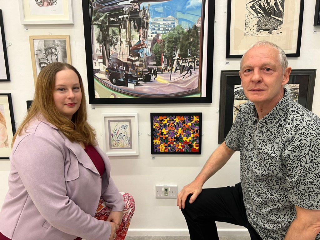 Alison and Phillip infront of their art - Rhea Ramesh