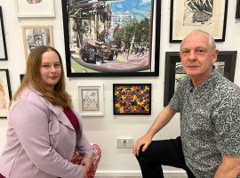 Alison and Phillip infront of the painting - Rhea Ramesh