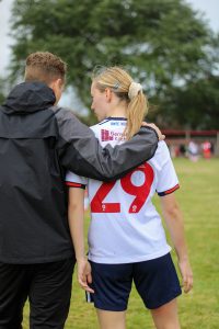 Lexi with Bolton Wanderers Womens manager Myles Smith