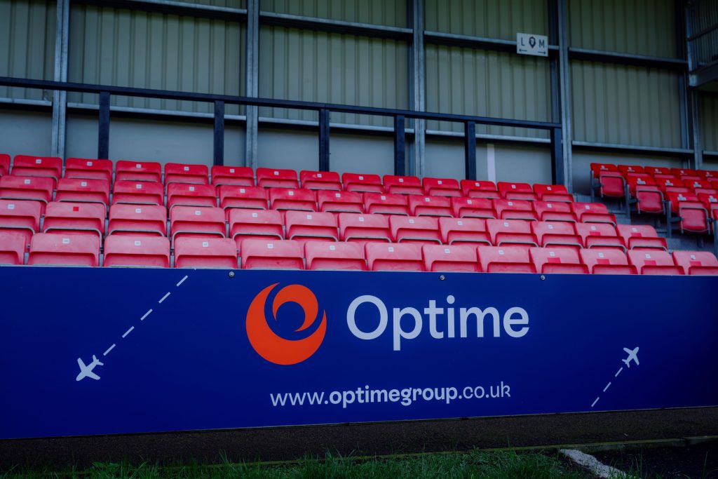 https://www.hcreatives.co.uk/ New Salford City FC sponsor advertisement in Peninsula Satdium.