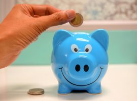 https://www.pexels.com/photo/person-putting-coin-in-a-piggy-bank-1602726/