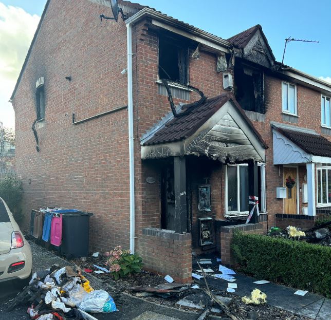 Eye-witness left in "utter shock" after a woman in her 50s was left injured after a house fire