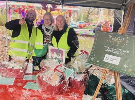 Merry volunteers at a stall from the event.