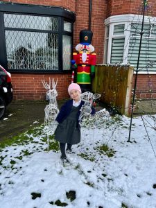 Image sent by Tammy of daughter Autumn with the reindeers. 