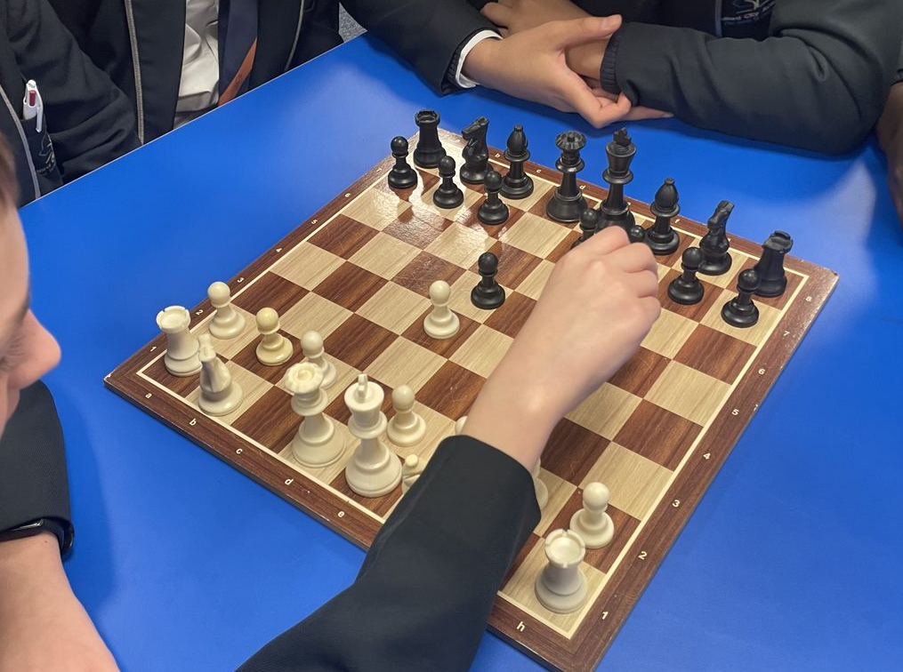 Salford City Academy's new chess and darts clubs take off with student