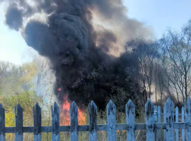 Fire and smoke can be seen after large tyres set a blaze.