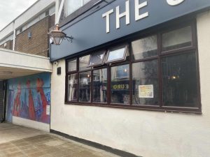 Community painted over the vandalism of the pub