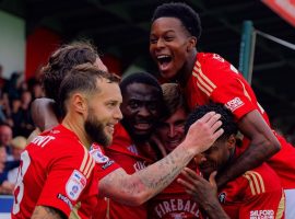 Salford City player s celebrate goal against Tranmere Rovers