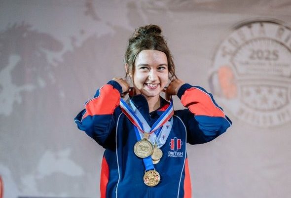 A 17-year-old powerlifter from Salford has become a World Champion for the second time, breaking a 20-year-old World Record