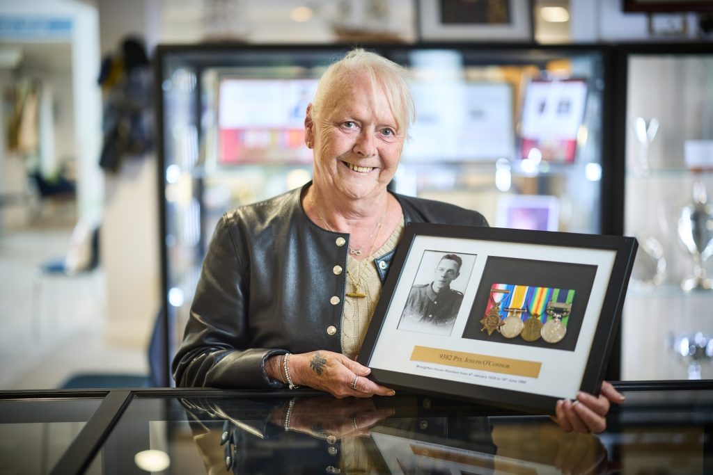 Elaine Prince with her grandfather's medals which are on display at the Broughton House Veteran Care Village museum (1)
