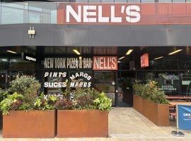 Nell's pizza opens Media City branch offering karaoke and a disco theme