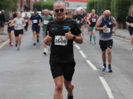 Billy McCrindles is running the Valencia Marathon in support of a Salford homelessness charity.