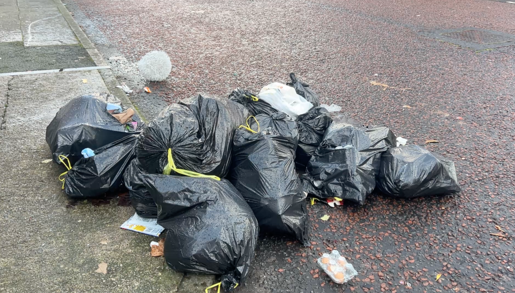 Fly tipping rubbish in Langworthy